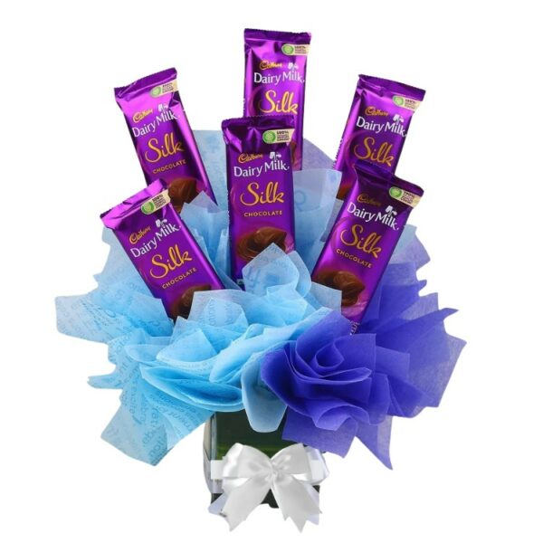 # 01 - A Beautiful Arrangement of 6 Cadbury Silk Chocolates in a Re-usable Glass Vase